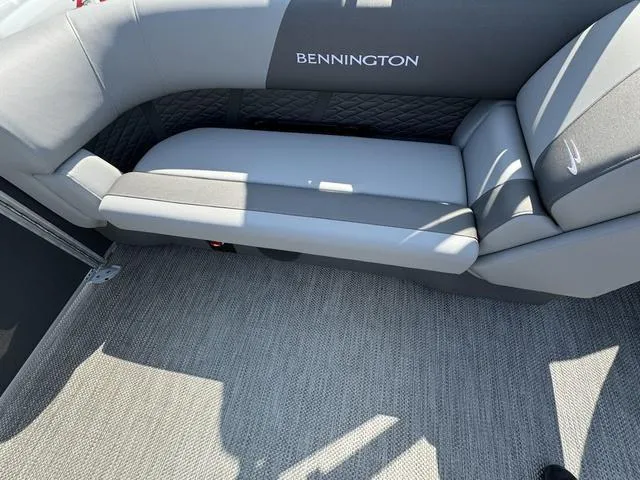 Slide: The Image of 2024 Bennington 22 SSR boat interior seating in gray and white. - 8
