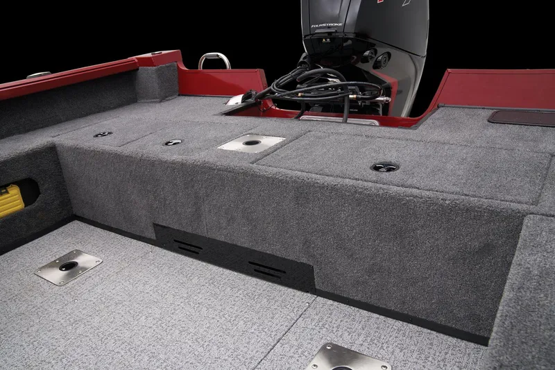Slide: The Image of 2024 Ranger VS1682SC Angler boat interior with motor and carpeted deck. - 43