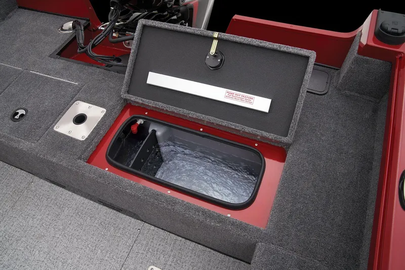 Slide: The Image of 2024 Ranger VS1682SC Angler boat storage compartment with open lid. - 48