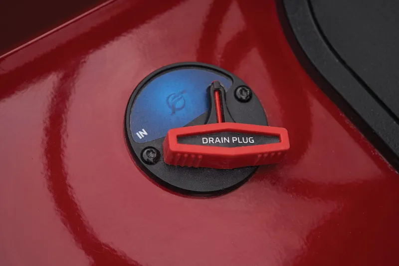 Slide: The Image of 2024 Ranger VS1682SC Angler drain plug on red surface. - 49