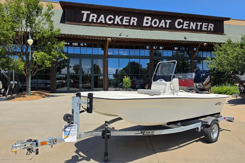 Slide: The Image of 2024 Mako Pro Skiff 13 CC boat on trailer at Tracker Boat Center. - 2