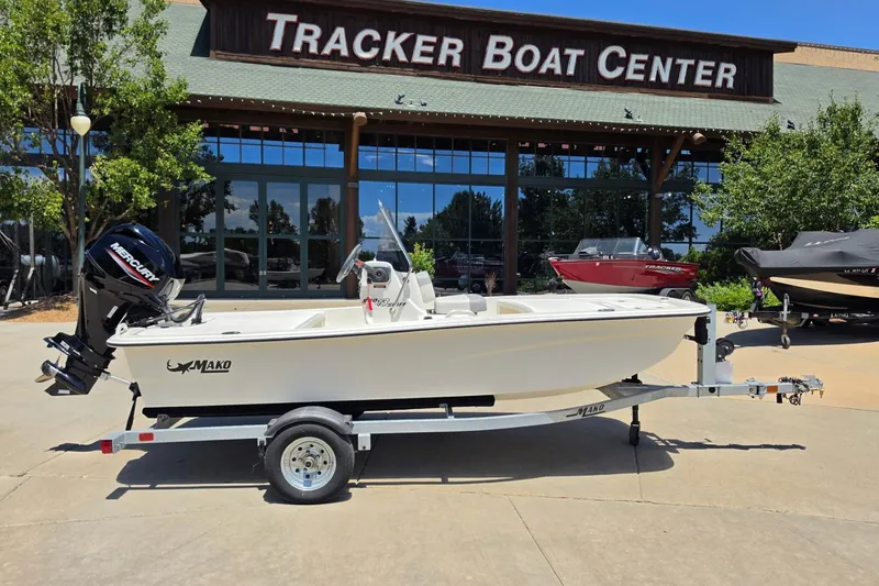Slide: The Image of 2024 Mako Pro Skiff 13 CC boat on trailer at Tracker Boat Center. - 1