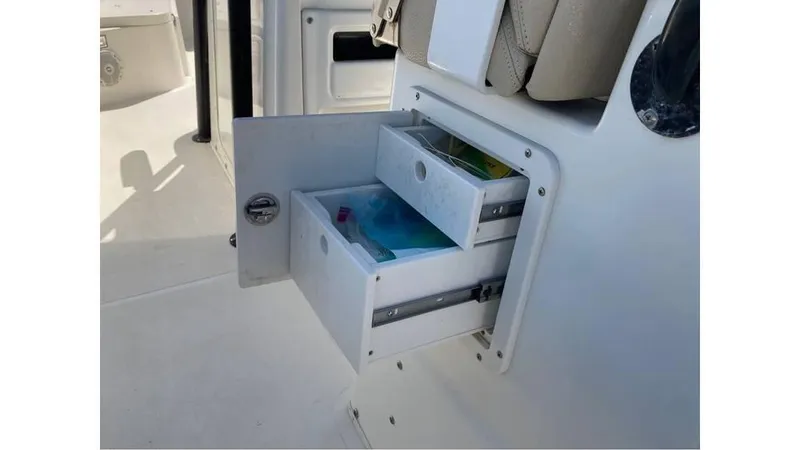 Slide: The Image of Storage drawers on a 2018 NauticStar 2800 XS boat. - 10