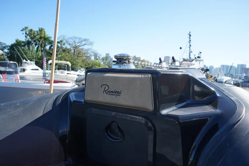 Slide: The Image of 2023 Ranieri CAYMAN 26 SPORT TOURING boat at marina, close-up of the console. - 28
