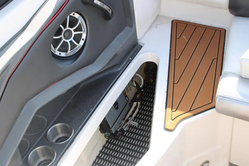 Slide: The Image of Interior of 2013 Monterey 234 SS boat with speaker and cup holders. - 17