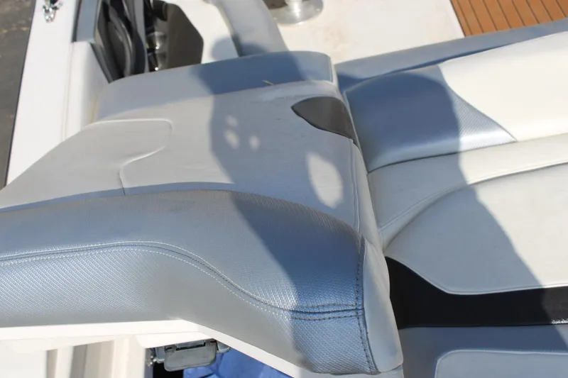 Slide: The Image of Close-up of 2013 Monterey 234 SS boat seat with gray and white upholstery. - 33
