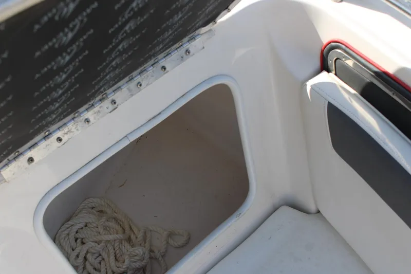 Slide: The Image of Storage compartment with rope in 2013 Monterey 234 SS boat. - 15