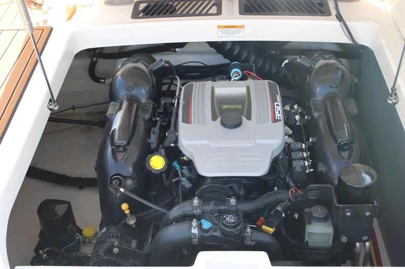 Slide: The Image of 2013 Monterey 234 SS boat engine compartment with 350 MAG motor. - 18