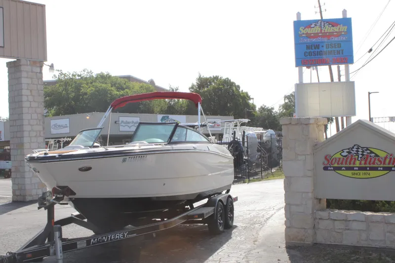 Slide: The Image of 2013 Monterey 234 SS boat on trailer at South Austin Marine dealership. - 4