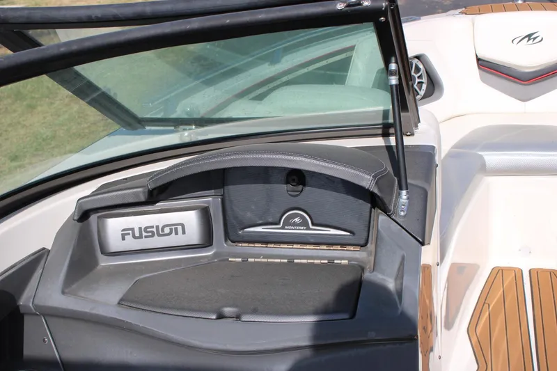 Slide: The Image of Interior of 2013 Monterey 234 SS boat with Fusion audio system. - 9