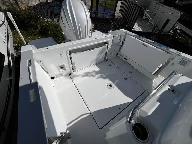 Slide: The Image of 2024 Jeanneau Leader 7.5 CC Series 3 boat deck with storage compartments. - 26