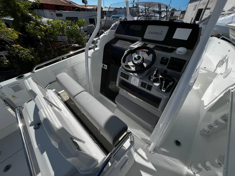 Slide: The Image of 2024 Jeanneau Leader 7.5 CC Series 3 boat cockpit with Garmin navigation system. - 30