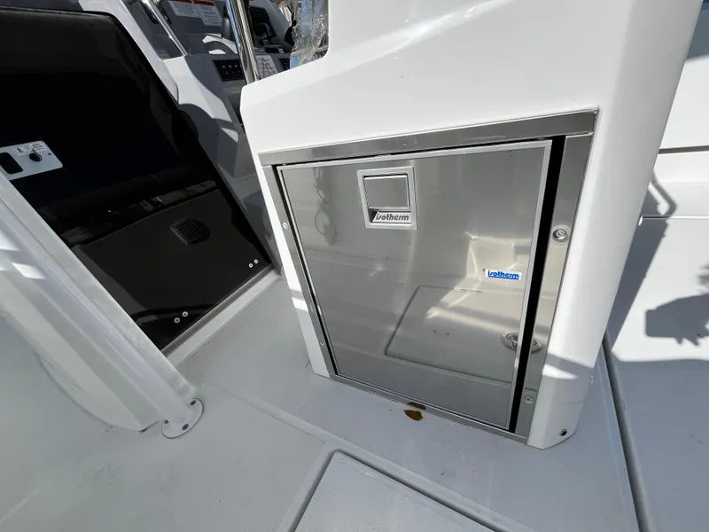 Slide: The Image of 2024 Jeanneau Leader 7.5 CC Series 3 boat interior with storage compartment. - 34