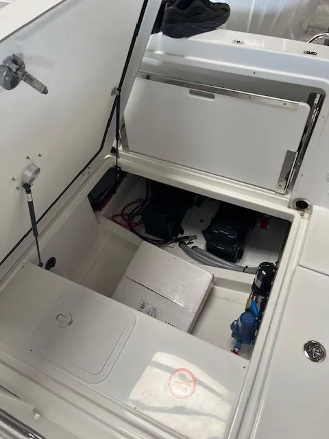 Slide: The Image of 2024 Jeanneau Leader 7.5 CC Series 3 boat storage compartment and equipment. - 49