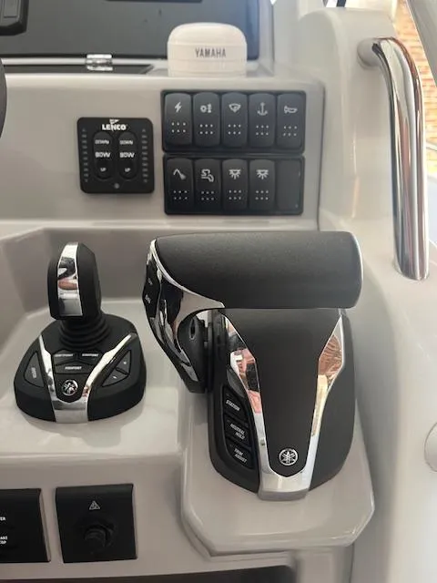 Slide: The Image of 2024 Jeanneau Leader 7.5 CC Series 3 boat controls and dashboard. - 10