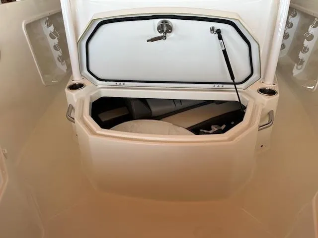 Slide: The Image of 2024 Jeanneau Leader 7.5 CC Series 3 storage compartment with open hatch. - 13
