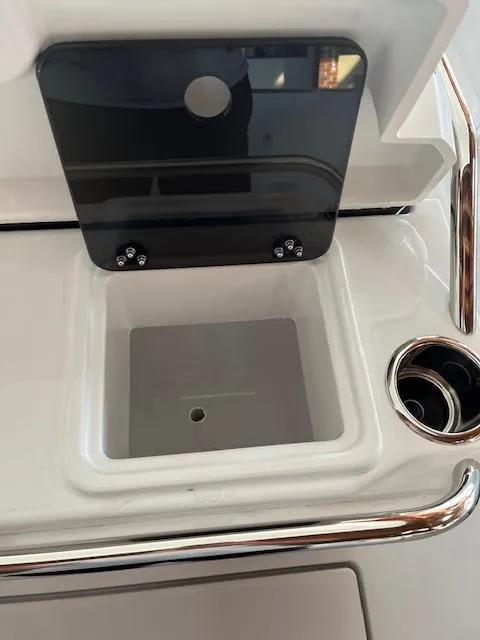 Slide: The Image of 2024 Jeanneau Leader 7.5 CC Series 3 boat console with storage compartment. - 18