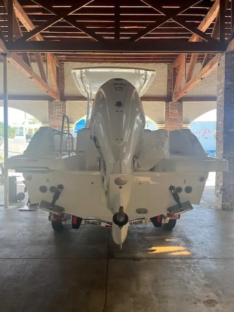 Slide: The Image of 2024 Jeanneau Leader 7.5 CC Series 3 boat in a covered dock. - 27