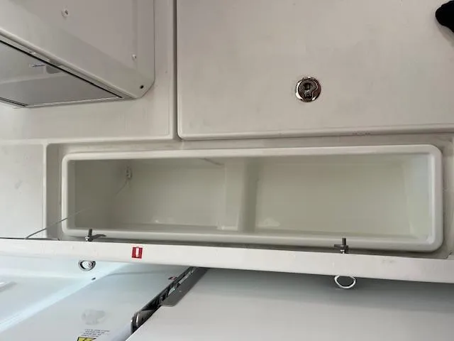 Slide: The Image of Storage compartment in 2024 Jeanneau Leader 7.5 CC Series 3 boat. - 3