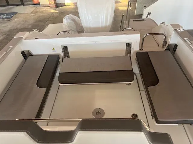 Slide: The Image of 2024 Jeanneau Leader 7.5 CC Series 3 boat interior seating area. - 4