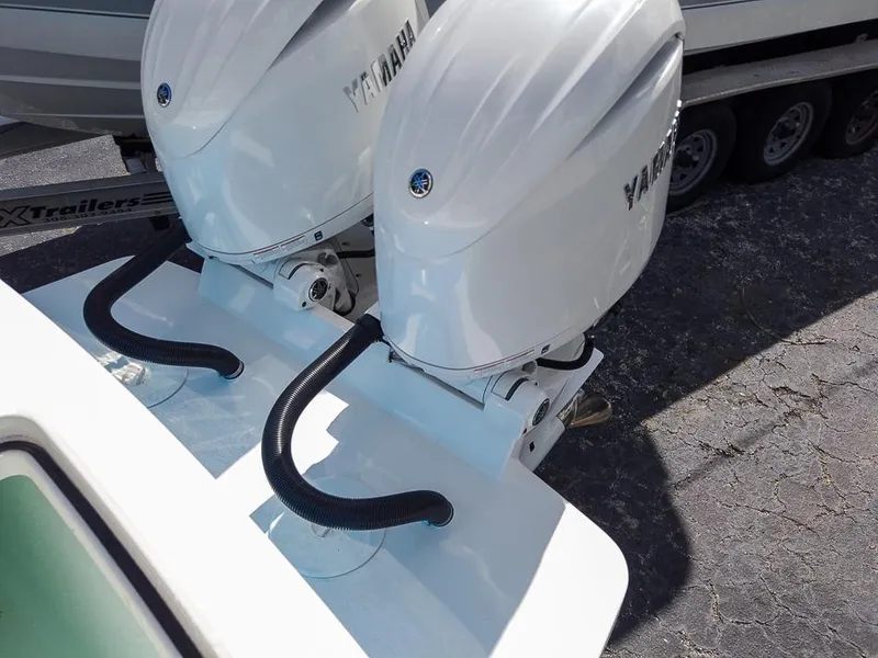 Slide: The Image of 2025 Regulator 23 Center Console with twin Yamaha outboard engines. - 17