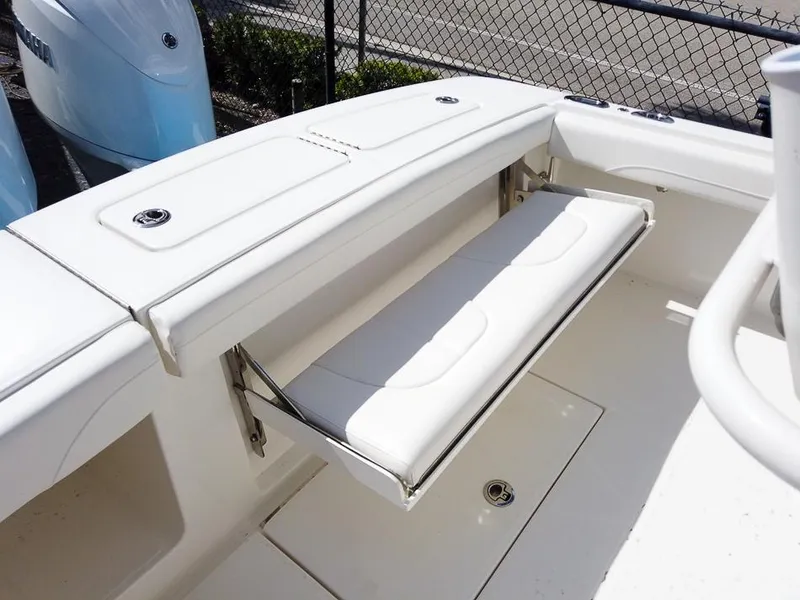 Slide: The Image of 2025 Regulator 23 Center Console boat with foldable rear bench seat. - 9
