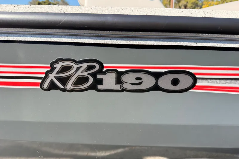 Slide: The Image of 2026 Ranger RB190 logo with red and white stripes on a boat exterior. - 3