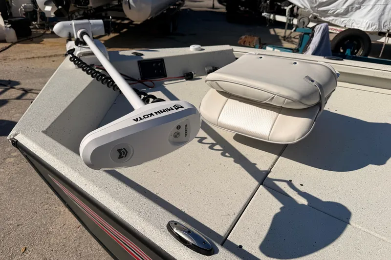 Slide: The Image of 2026 Ranger RB190 boat deck with Minn Kota trolling motor and cushioned seat. - 8
