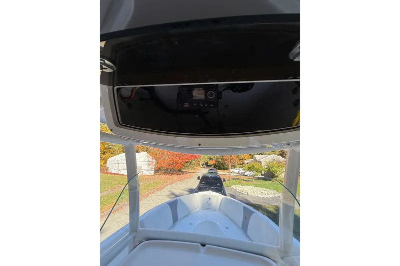 Slide: The Image of 2017 Century 2600 CC boat interior view with console and windshield. - 11