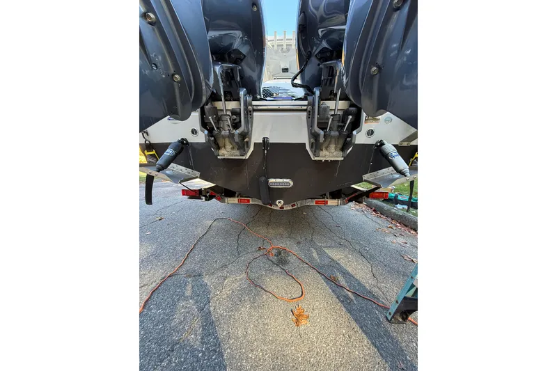 Slide: The Image of Rear view of a 2017 Century 2600 CC boat with dual outboard motors. - 5