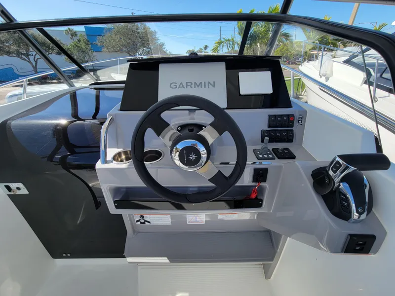 Slide: The Image of 2024 Jeanneau Leader WA 7.5 helm with Garmin navigation system. - 9
