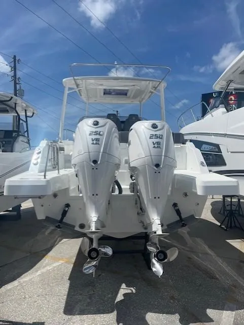 Slide: The Image of 2024 Jeanneau Leader 9.0 WA with twin 250 HP engines, rear view. - 16