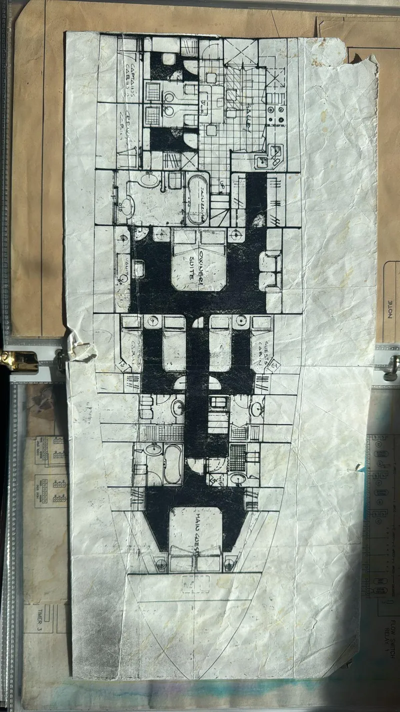 Slide: The Image of Blueprint of a 1995 Mangusta Motor Yacht, showcasing detailed interior layout and design. - 40