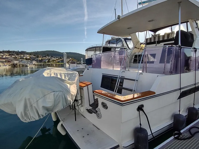 Slide: The Image of 1989 Ocean Alexander 440 CPMY yacht docked at marina. - 13