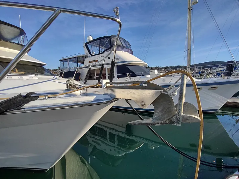 Slide: The Image of 1989 Ocean Alexander 440 CPMY yacht docked at marina. - 16