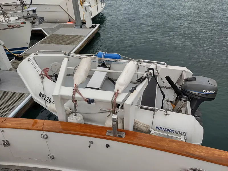 Slide: The Image of Ocean Alexander 440 CPMY 1989 yacht with Bullfrog Boats dinghy and Yamaha outboard motor. - 21