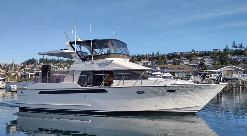 Slide: The Image of 1989 Ocean Alexander 440 CPMY yacht docked in a marina. - 3