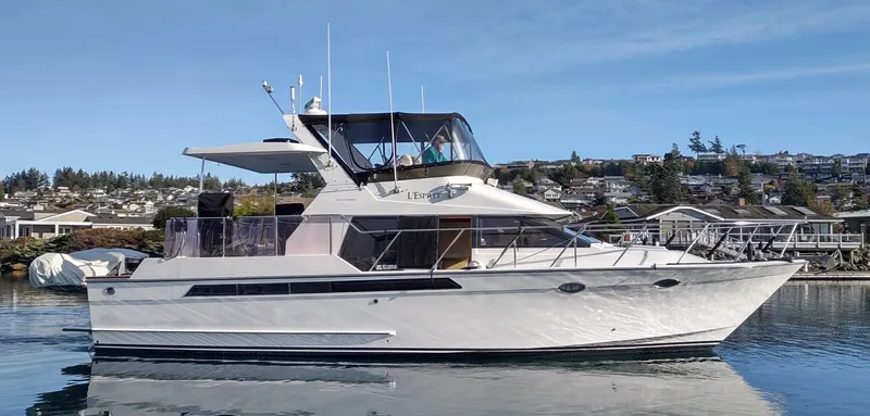 Slide: The Image of 1989 Ocean Alexander 440 CPMY yacht on calm water. - 4