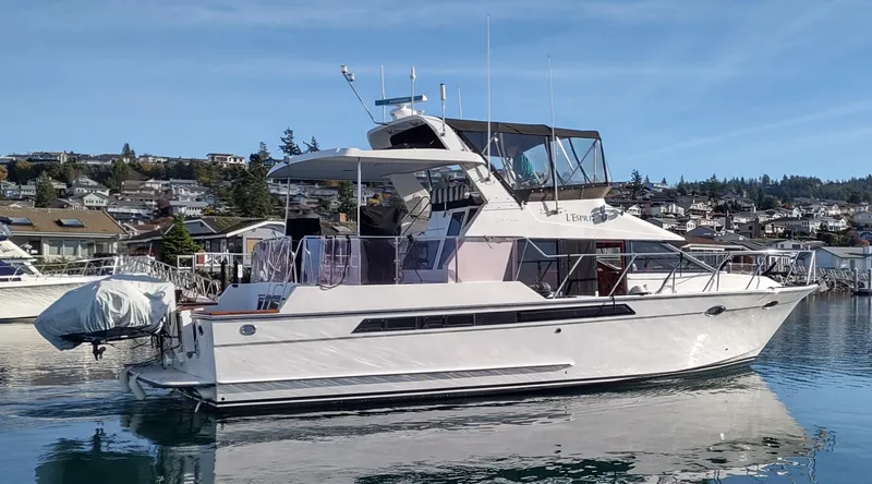 Slide: The Image of 1989 Ocean Alexander 440 CPMY yacht docked in a marina. - 6