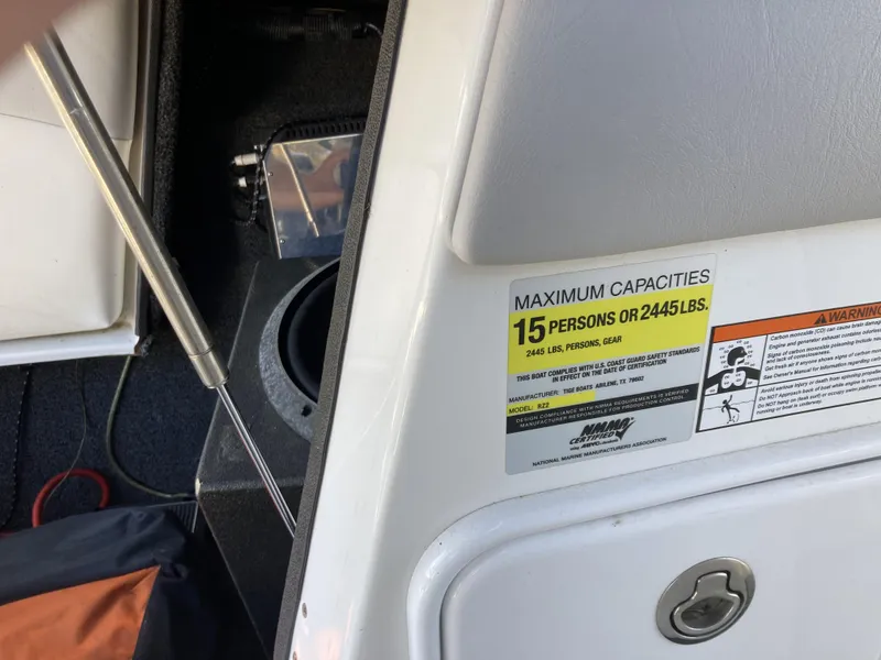 Slide: The Image of 2011 Tigé RZ2 boat capacity label, maximum 15 persons or 2445 lbs. - 9