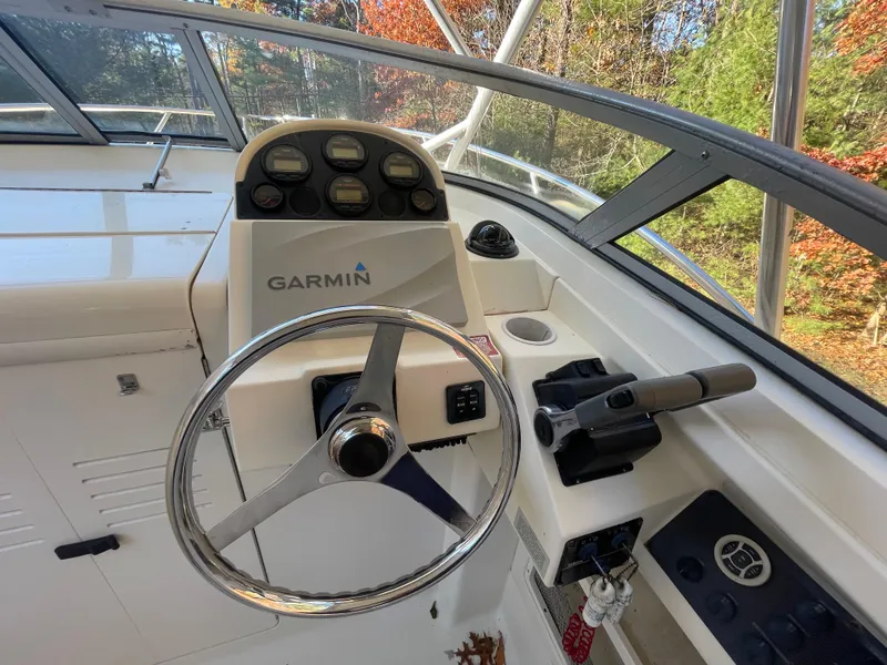 Slide: The Image of 2003 Scout 280 Abaco boat helm with Garmin navigation system. - 14