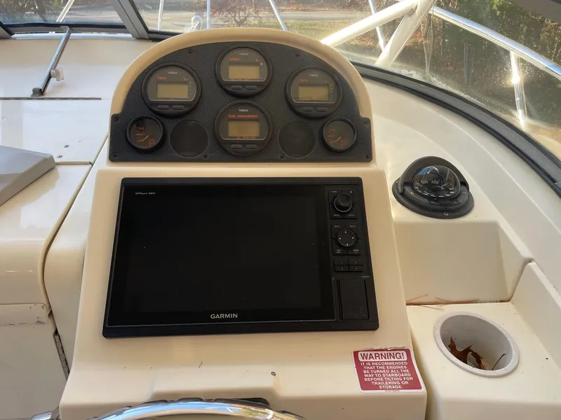 Slide: The Image of Dashboard of 2003 Scout 280 Abaco boat with Garmin navigation system. - 15