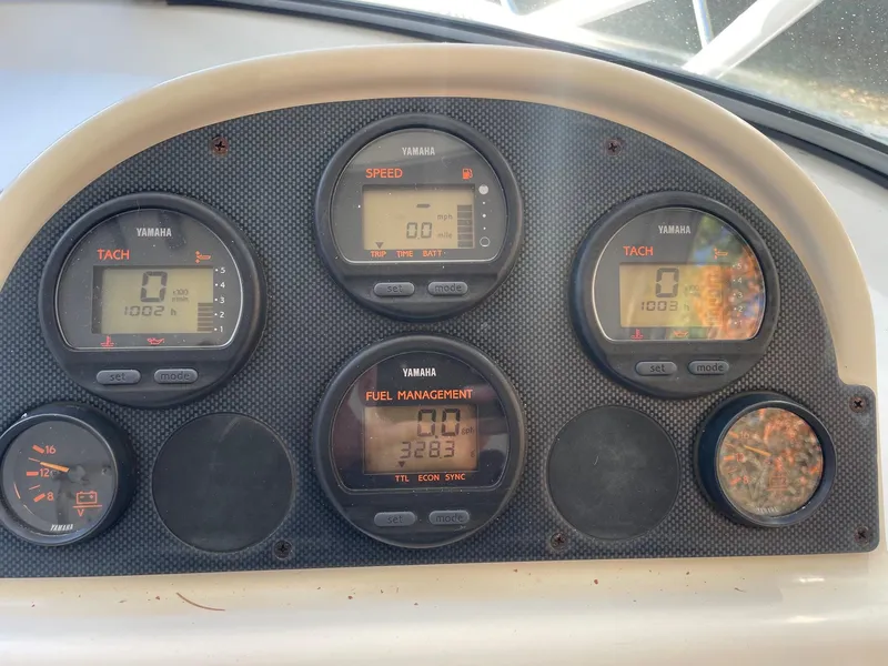 Slide: The Image of Dashboard of a 2003 Scout 280 Abaco boat with Yamaha gauges. - 16