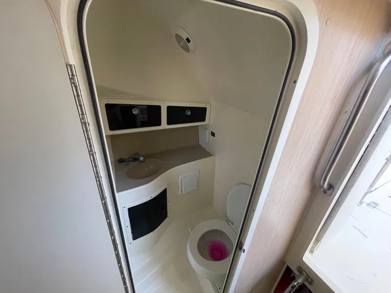 Slide: The Image of 2003 Scout 280 Abaco boat bathroom interior with sink and toilet. - 20