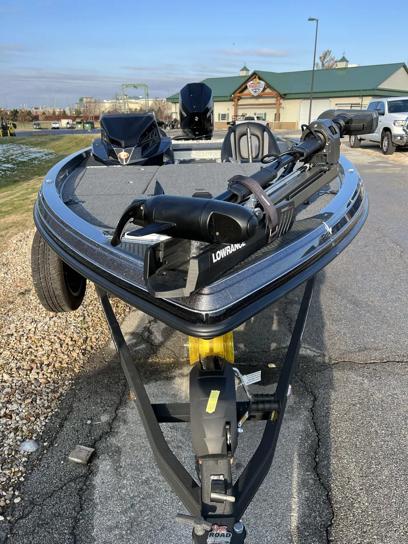 Slide: The Image of 2024 Ranger Z518 Ranger Cup Equipped fishing boat on trailer. - 2