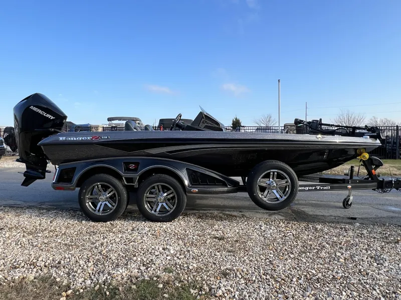 Slide: The Image of 2024 Ranger Z518 Ranger Cup Equipped boat on a trailer, side view. - 4