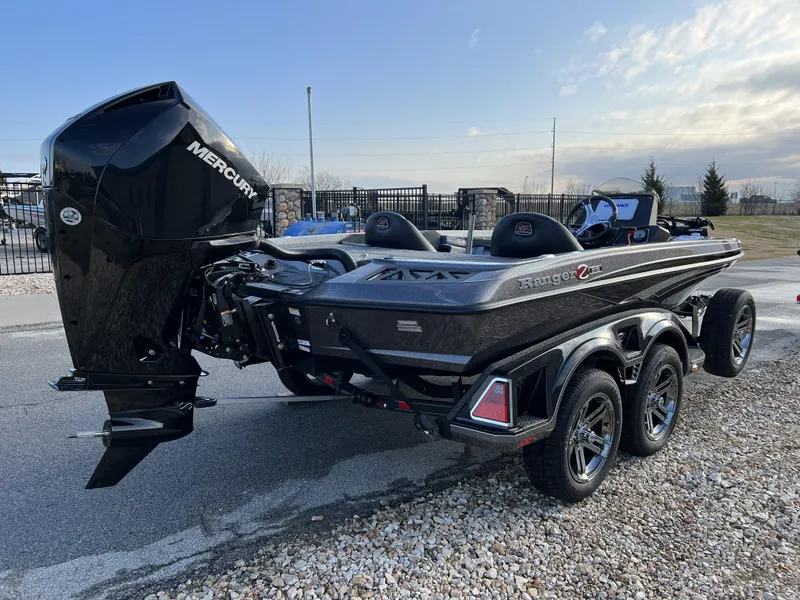 Slide: The Image of 2024 Ranger Z518 Ranger Cup Equipped boat with Mercury outboard engine on a trailer. - 5