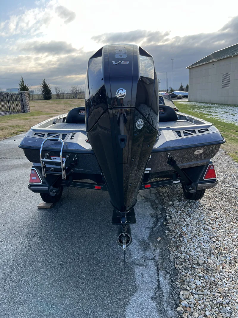 Slide: The Image of 2024 Ranger Z518 Ranger Cup Equipped boat with powerful outboard motor. - 6