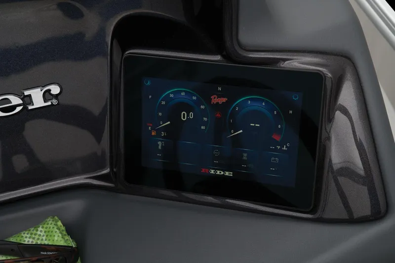 Slide: The Image of 2024 Ranger Reata 243C dashboard display showing speed and engine metrics. - 42