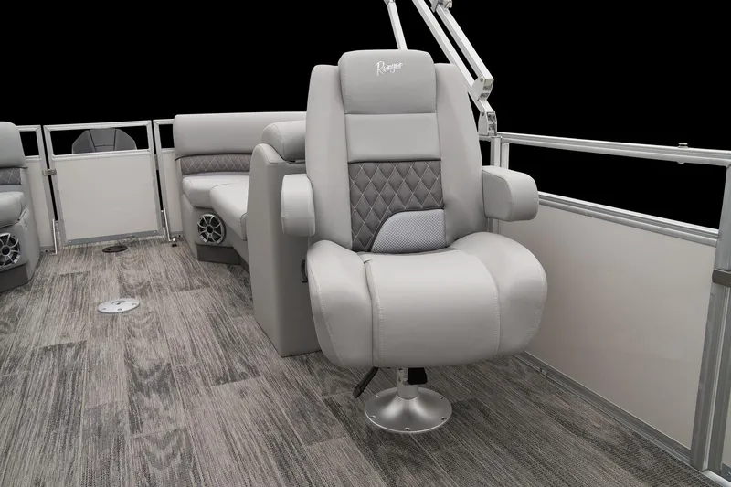 Slide: The Image of 2024 Ranger Reata 243C boat interior with luxurious seating and modern design. - 45